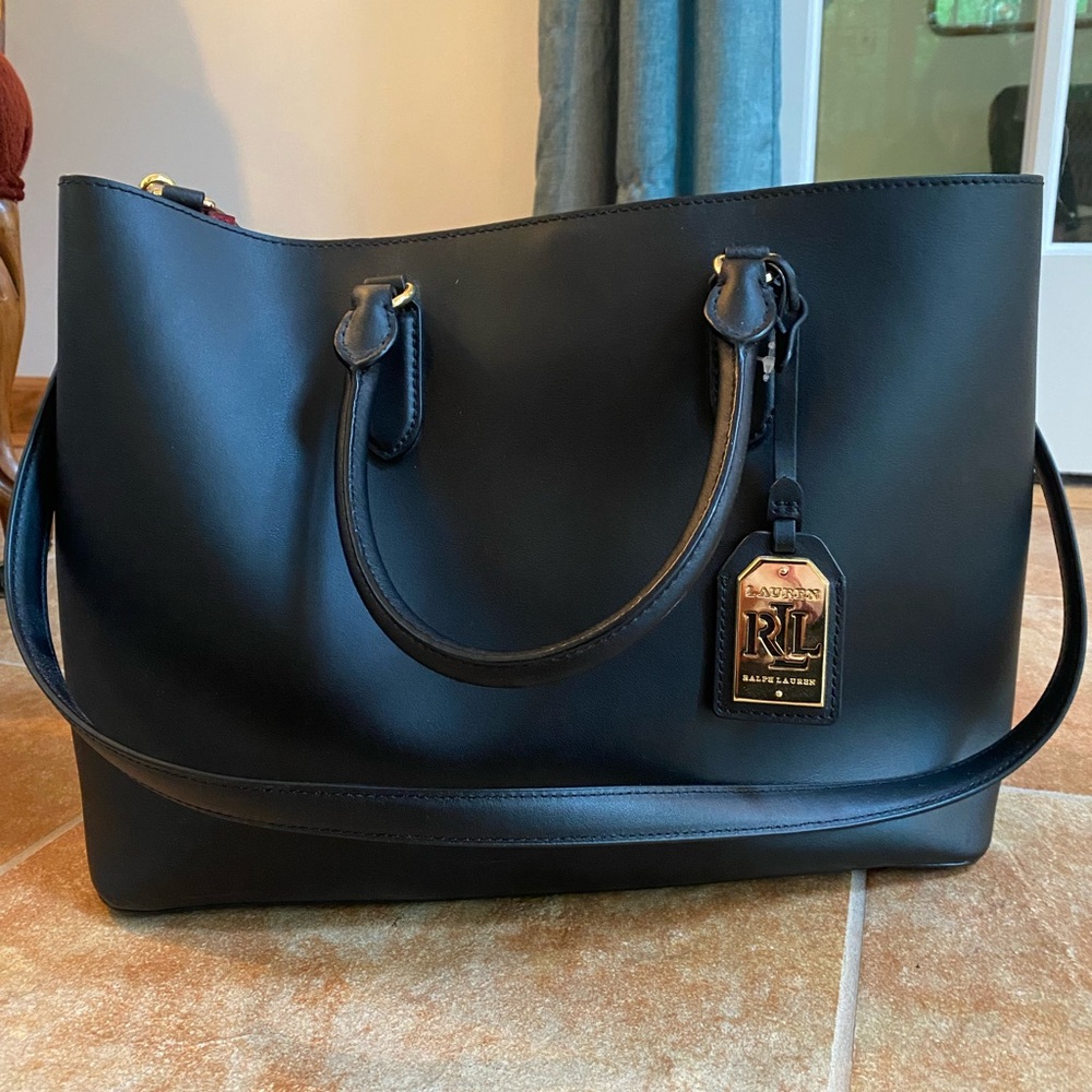 Black and red leather Ralph Lauren purse new. Does not come with tags.